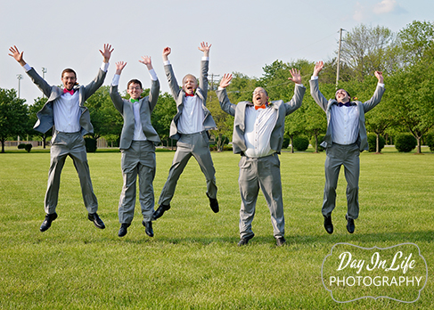wedding groom party jumping in mid air